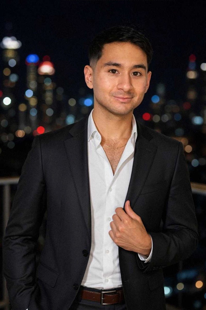 Nathan Soufer wearing a black suit